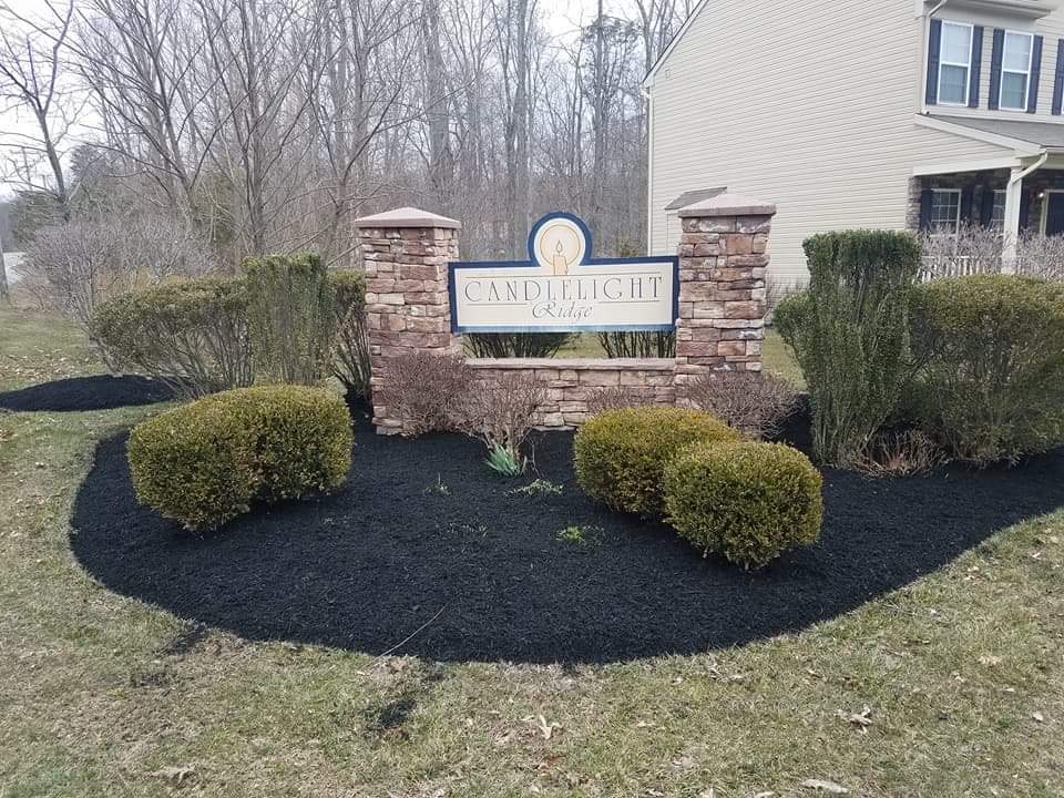 Stone entrance sign with mulch bed, Cecil County MD